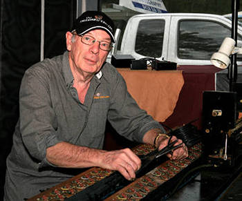 Ean_working_on_a_pianola